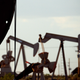 Pumpjacks work in a field near Lovington, N.M.